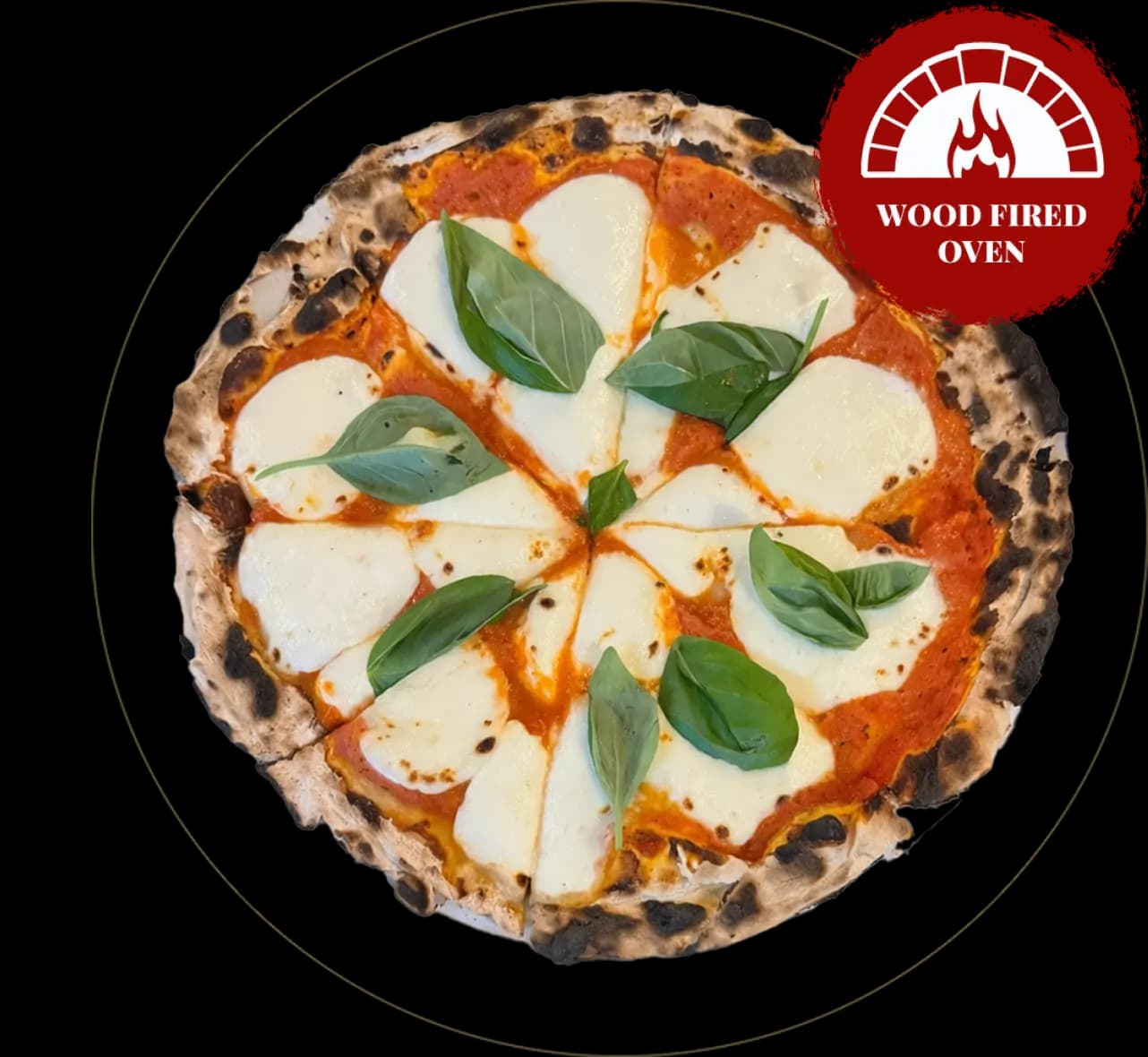 Wood-fired pizza topped with prosciutto, arugula, cherry tomatoes, and parmesan